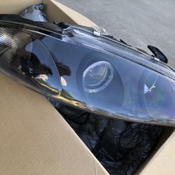 1997-99 Mitsubishi eclipse Projector headlights.