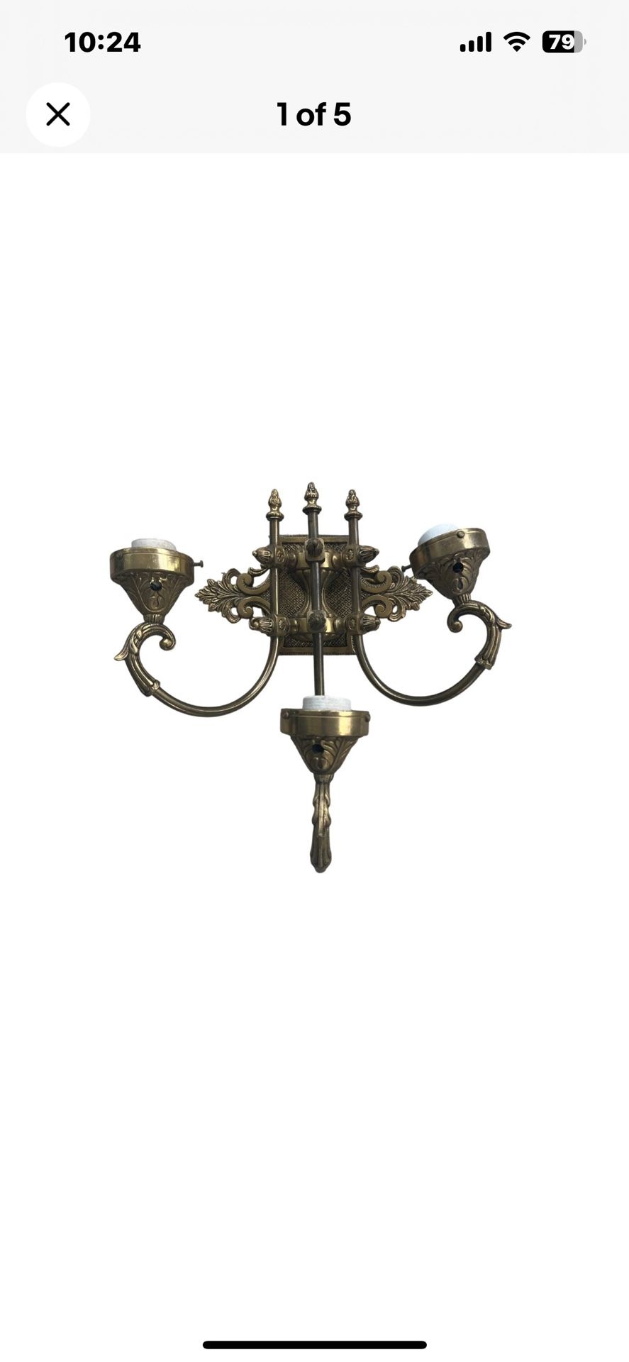 Antique Brass Ornate Candle Sconce 3 light. Item is about 13” x 13”. 