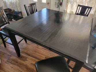 Ashley Expanding Dining Room Table + 8 Chairs