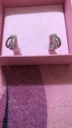 crusher $150 Swarovski earrings , skull basher axe $50