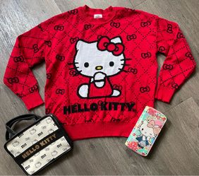 Lightly used hello kitty set. Sweater is a juniors medium