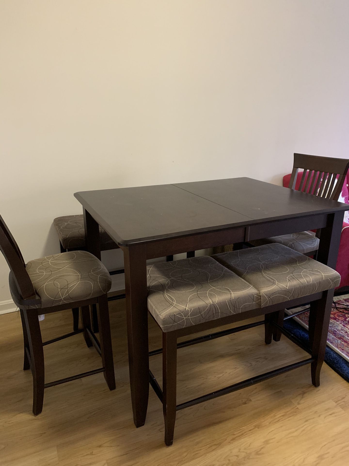 Dining table with two matching chairs and benches