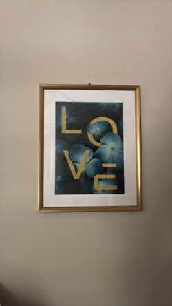 Gold frame “Love” photo