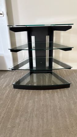 Glass media stand