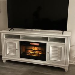 66 inch tv stand with heater paid 1200 brand new