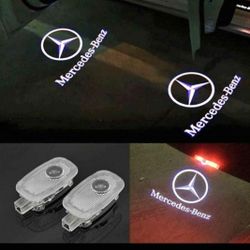 2 Mercedes Benz door Projector Lights. SEE ALL PICS 4 MORE MERCEDES SOLD SEPARATELY. SHIPPING AVAILABLE