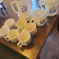 set of cups with jug