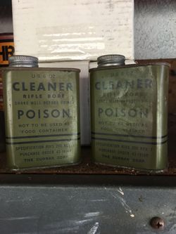 Two cans of U.S. WW II rifle bore cleaner