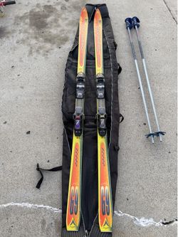 Dynastar 69 Power Grip Coupe Racing Skis with Marker Twin Cam M44 bindings w/ Aerro vector 7020 ski poles and 105 Meridien ski bag
