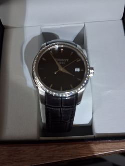 Tissot diamond bezel watch