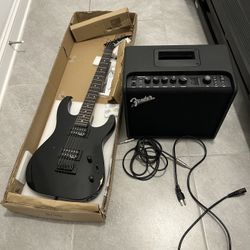 Guitar and Fender Mustang LT25 amp