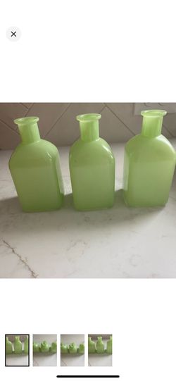 Set of 3 beautiful green glass bottles unused