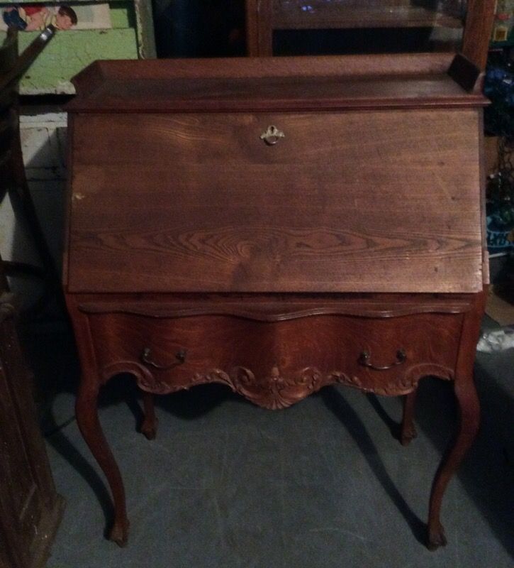 Antique oak serpentine desk