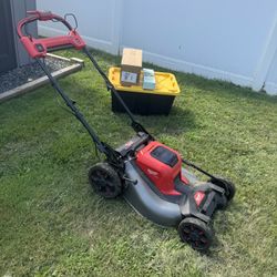 Milwaukee Electric Lawn Mower With Batteries & Dewalt 70Volt Electric Weed Wacker 