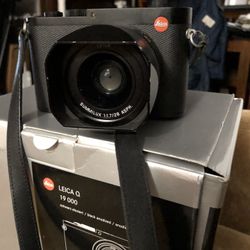 Leica Q with paperwork