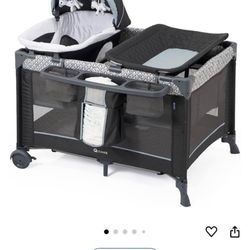 Full size bassinet- changing table-storage shelf
