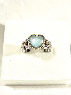 New 18 karat gold & .925 silver ring with 4 authentic diamonds and heart shaped aquamarine. Size 7.