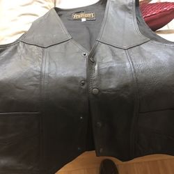 Leather vest XL with Harley emblem lower back.