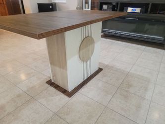 Modern pedestal dining table