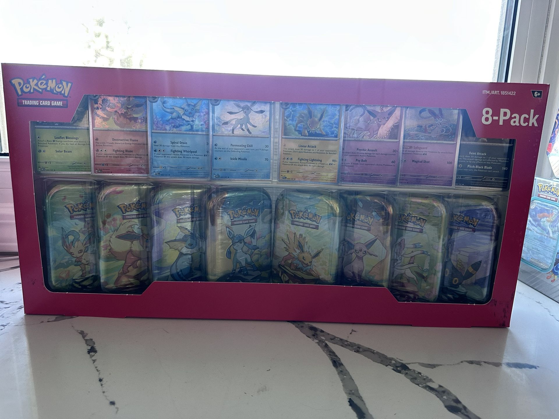 Pokemon Prismatic Evolution Tin Pack
