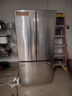 Used GE 24.7 cu. ft. Refrigerator – Good Condition