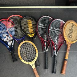 Six Tennis Rackets And One Handball Racket