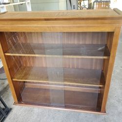 Wooden Curio Cabinet With Sliding Glass Doors
