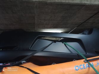 A grill for an accord and bumper for a Nissan leaf