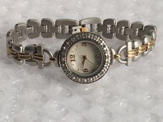 PRETTY GOLD AND SILVER TONE LADIES WATCH.