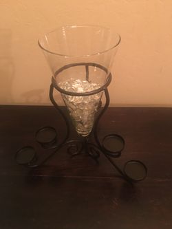 Black candle holder with glass beads included.Harris and Stine