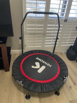Mini trampoline with hand bar