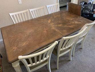 Dining Table Set with 6 White Chairs and Wood Top.