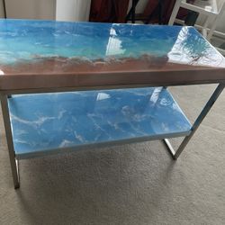 SMALL HAND MADE EPOXY OCEAN LOOK TABLE…..39W29H16D…..CAN BE USE FOR HALL KITCHEN ETC ETC FAS A DECOR TABLE