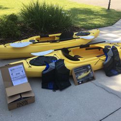 2 Kayaks With Life Jackets, Paddles & Hoist
