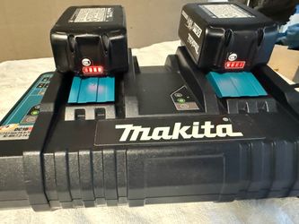 Makita 18v Dual Charger and 2 x 5.0 amp  batteries .