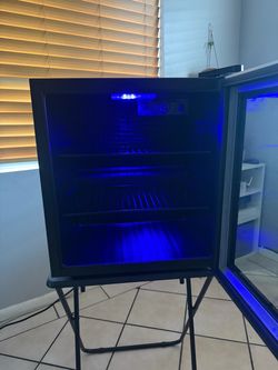 Antarctic star mini drink cooler with blue light fits like 50 to 55 cans