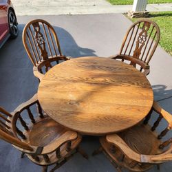 Vintage, solid Wood 42.5" Bear Claw legged table with 4 chairs,