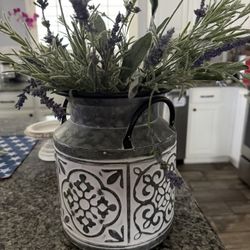 Decorative Canister With Flowers