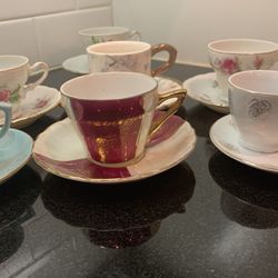 Seven demitasse cup sets