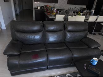 Used sofa with a stain
