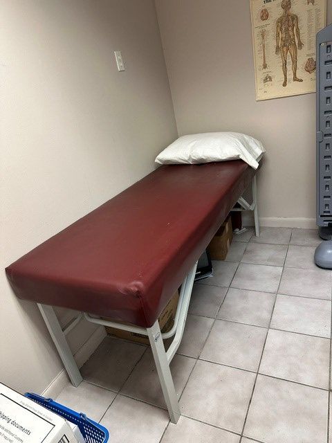 3. Medical Exam Table w/ Pillow — $120