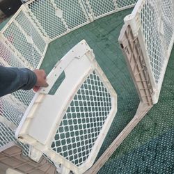 Large gate with door, can lay flat, comes a part for sizing