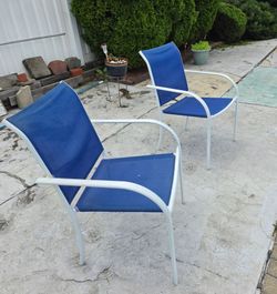 2/ Stackable chairs in good condition . $25 each
