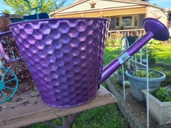 Purple metal watering can planter, by very cool stuff
