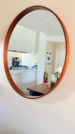 Mirror and pendant