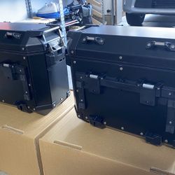 Triumph Tiger Black Pannier Side Boxes. Brand New Still In Box. 