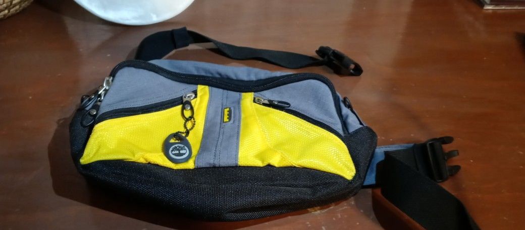  Timberland yellow and gray fannypack.Great used condition