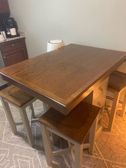 Wooden kitchen island with stools