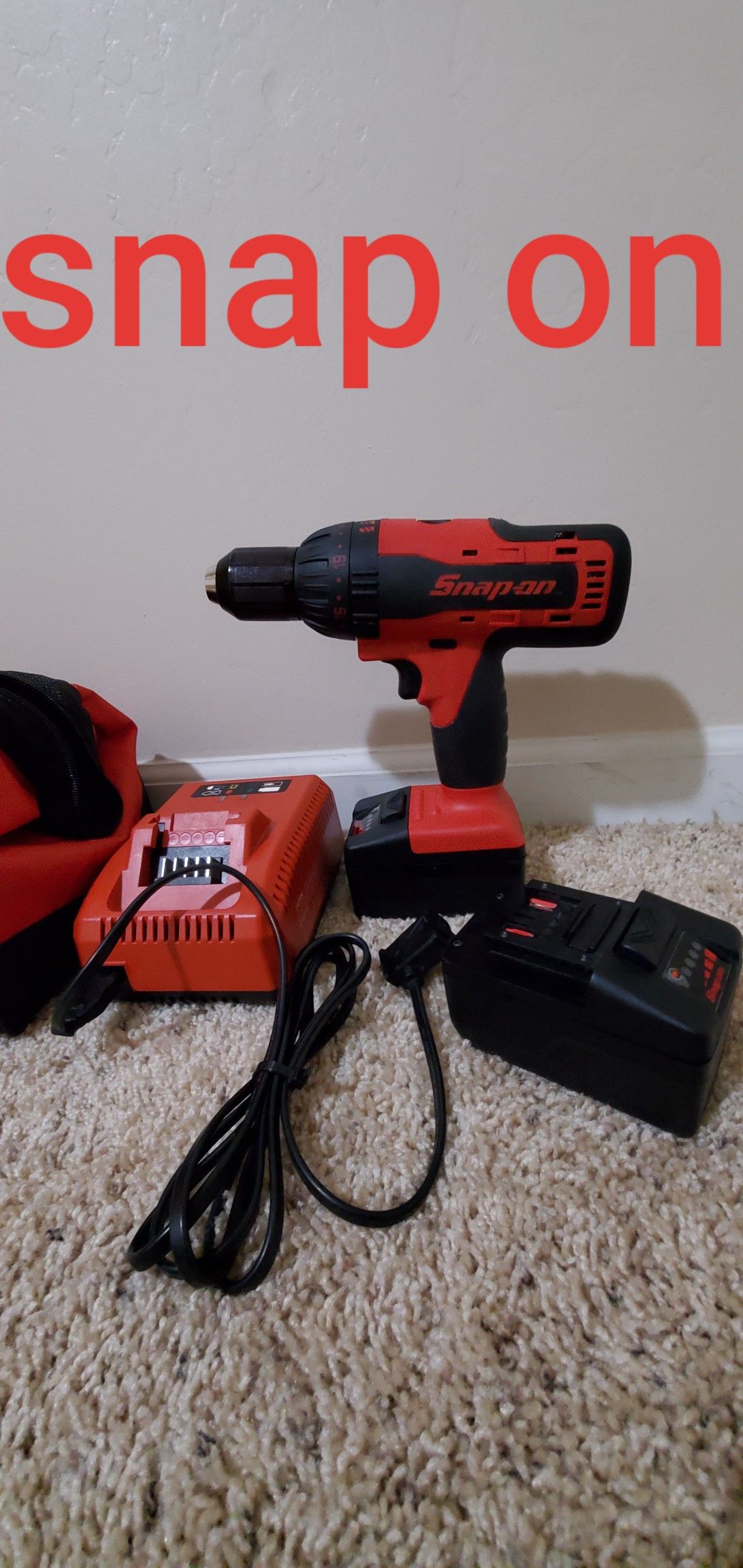 Snapon hammer drill with 2 4ah batteries and charger