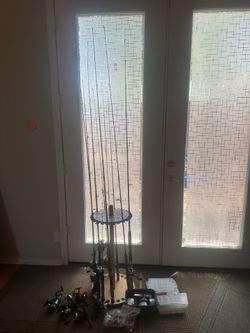 HUGE FISHING LOT 10 poles, holder REELS LINE ETC TAKE ALL